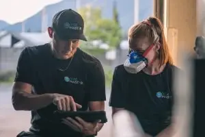 A coach sharing results with a client from a resting metabolic rate test with