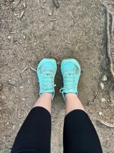 Runner choosing the best running shoes based on fit, support, and heel drop