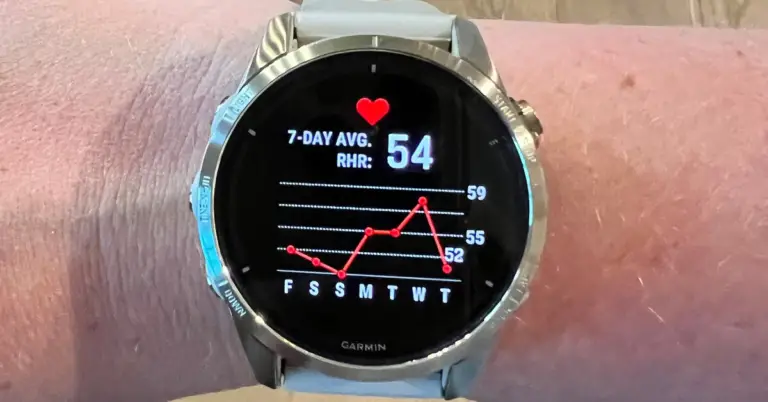 A Garmin watch showing resting heart rate