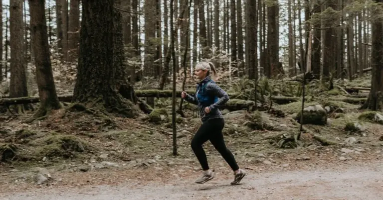 Female runner with knee osteoarthritis running on a trail